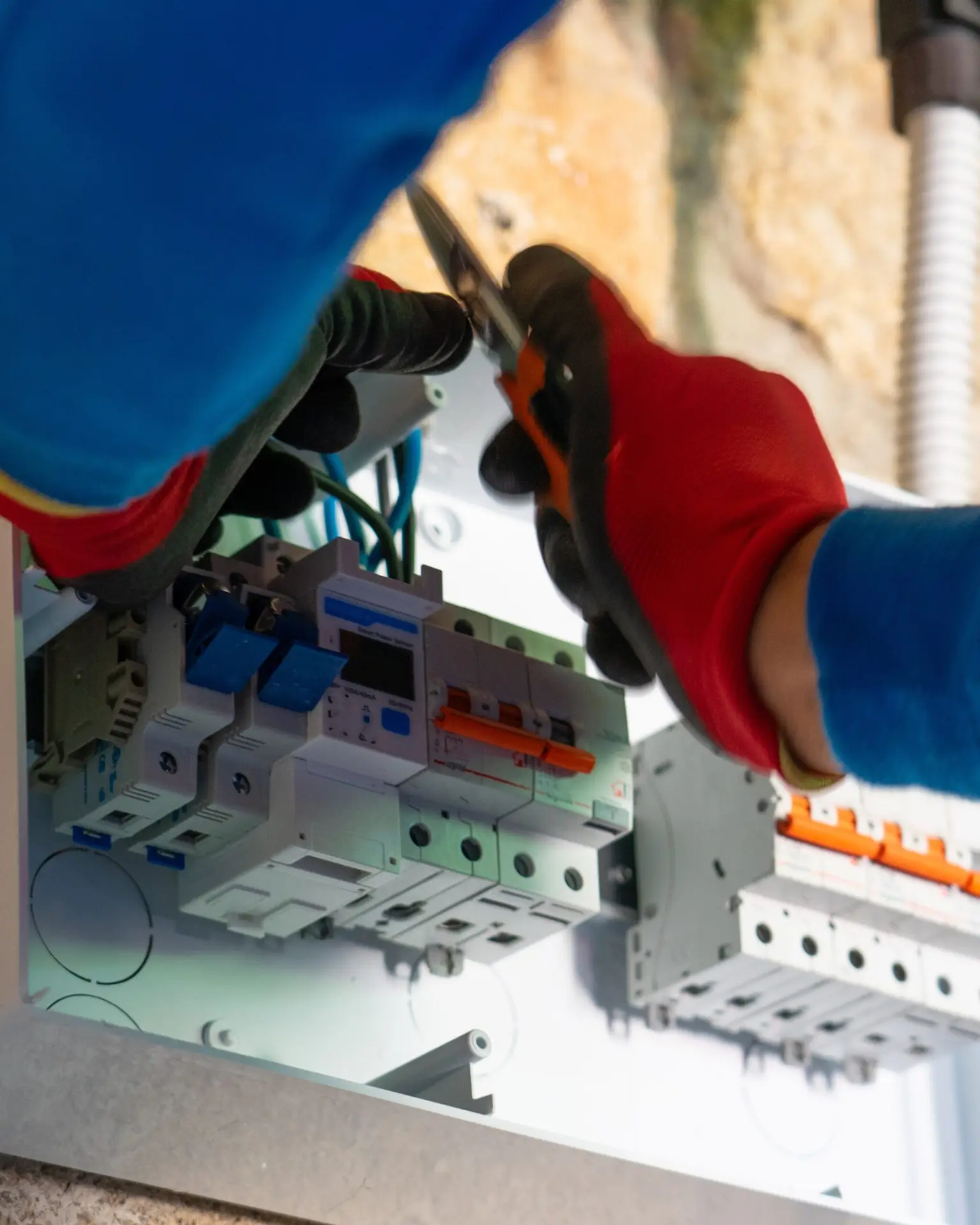 Electrician working with some fuses